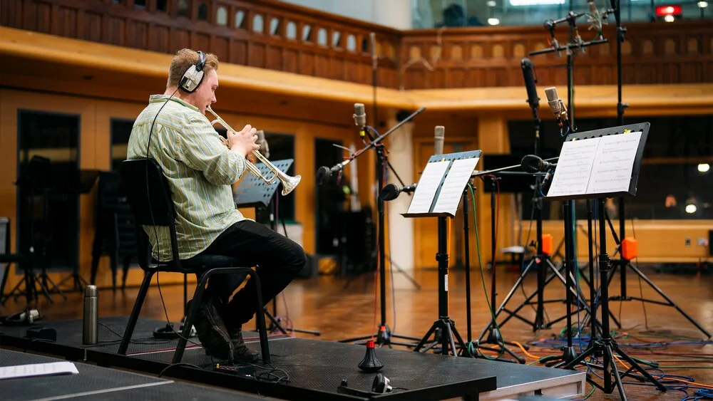 A trumpet recording session in a large space